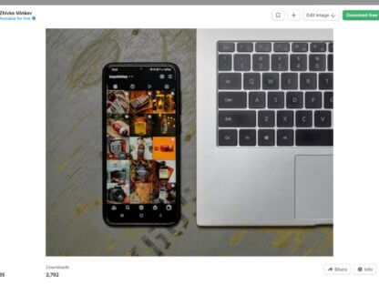 Instagram photo grid on smartphone next to laptop - how to download photos from social media