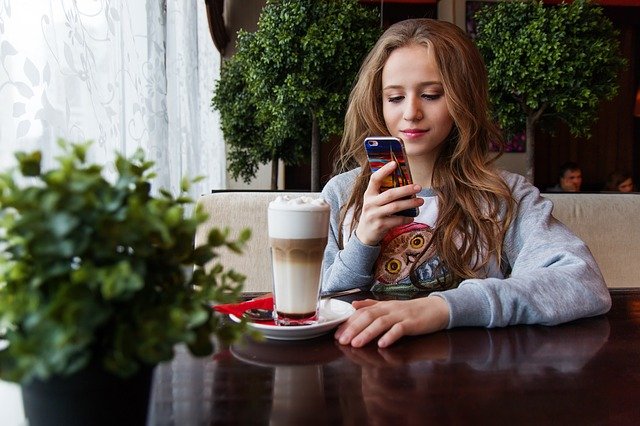 Teen Checking Mobile